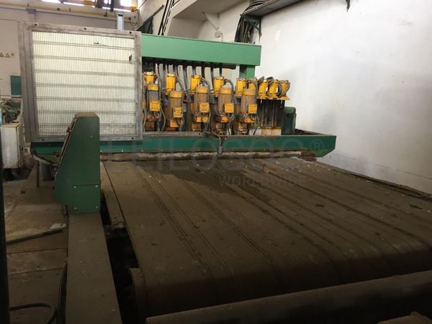 Multi-disco com 12 cabeças, corte longitudinal com tapete.