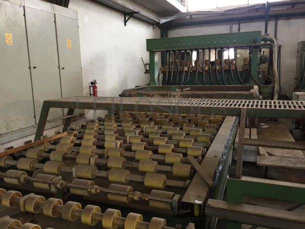 Multi-disco com 12 cabeças, corte longitudinal com tapete.