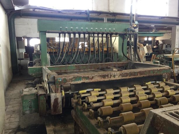 Multi-disco com 12 cabeças, corte longitudinal com tapete.