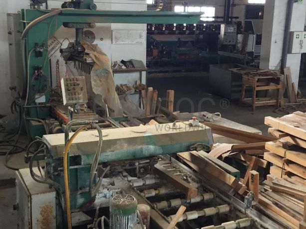 Alinhador de tiras com corta topos e descarregadora automática.