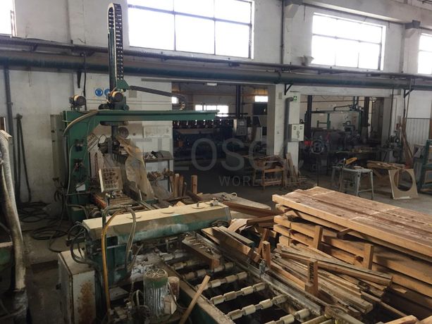 Alinhador de tiras com corta topos e descarregadora automática.