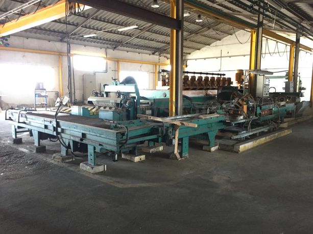 Linha de polimento com carregador automático. Máquina da marca BRETON 3.10 com três calibradores e 10 cabeças de polimento. Bizeladora rectifica e bizel com corta topos.