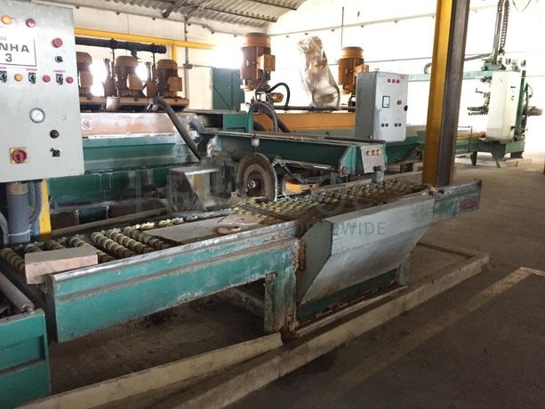 Linha de polimento com carregador automático. Máquina da marca BRETON 3.10 com três calibradores e 10 cabeças de polimento. Bizeladora rectifica e bizel com corta topos.