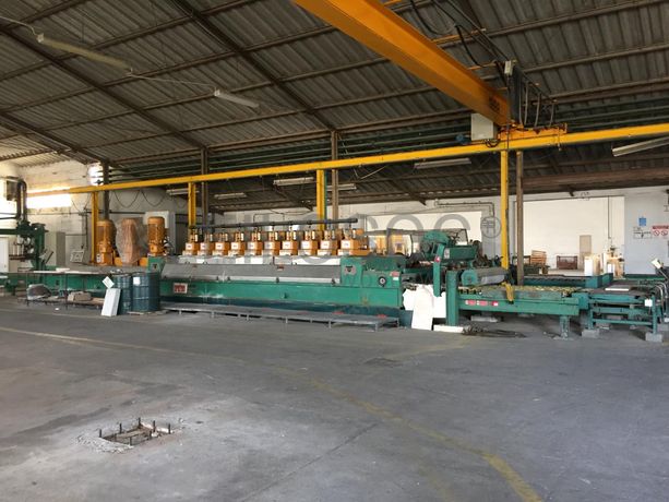 Linha de polimento com carregador automático. Máquina da marca BRETON 3.10 com três calibradores e 10 cabeças de polimento. Bizeladora rectifica e bizel com corta topos.