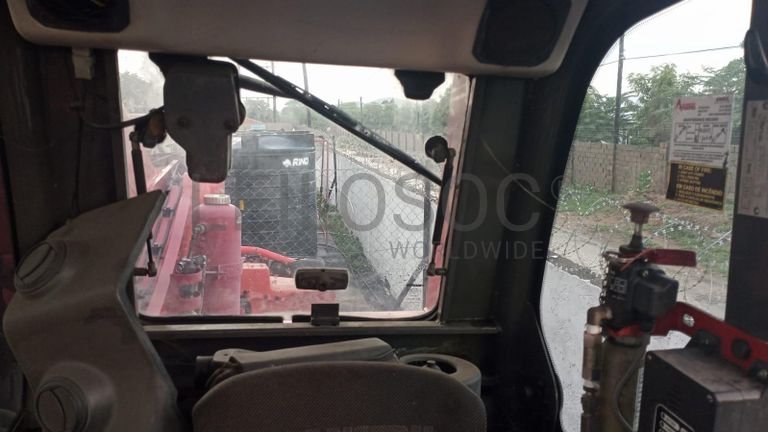 Empilhador Telescópico MANITOU MHT 10210 ·