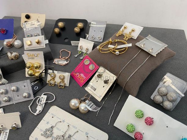 Brincos em prata e outros materiais