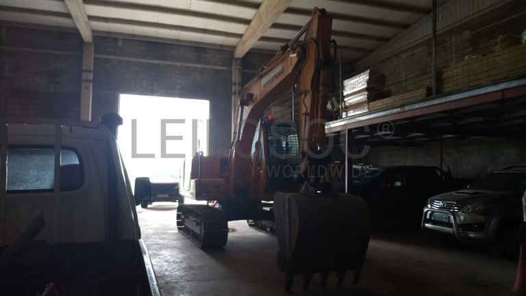 Escavadeira Hyundai ·