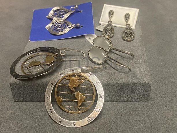 Brincos em prata e outros materiais