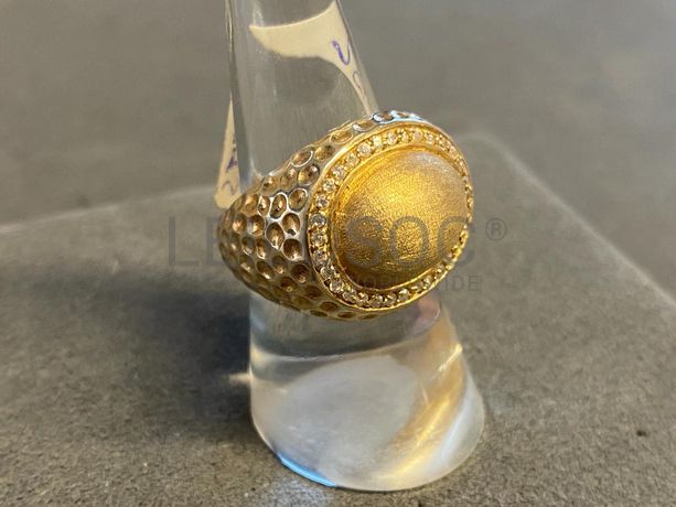 Anel em prata e outros materiais