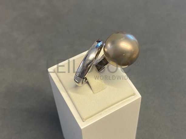 Anel em prata e outros materiais