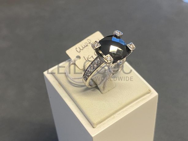 Anel em prata e outros materiais