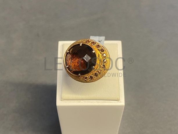 Anel em prata e outros materiais