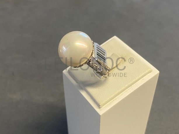 Anel em prata e outros materiais